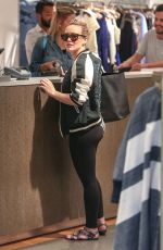 HILARY DUFF Shoping at Intermix in Los Angeles