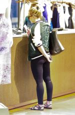 HILARY DUFF Shoping at Intermix in Los Angeles