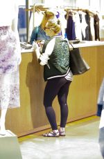 HILARY DUFF Shoping at Intermix in Los Angeles