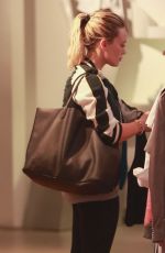 HILARY DUFF Shoping at Intermix in Los Angeles
