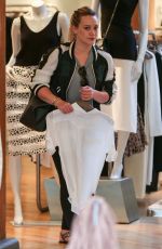 HILARY DUFF Shoping at Intermix in Los Angeles