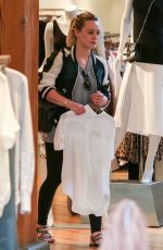 HILARY DUFF Shoping at Intermix in Los Angeles