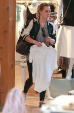 HILARY DUFF Shoping at Intermix in Los Angeles