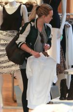 HILARY DUFF Shoping at Intermix in Los Angeles