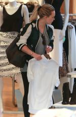 HILARY DUFF Shoping at Intermix in Los Angeles