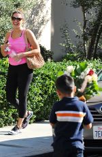 KELLY BROOK Gets Flowers from a Boy Out in Los Angeles