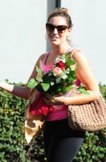 KELLY BROOK Gets Flowers from a Boy Out in Los Angeles