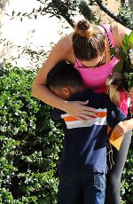 KELLY BROOK Gets Flowers from a Boy Out in Los Angeles