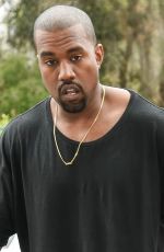 KIM KARDASHIAN and Kanye West Arrives at Roc Nation Pre-grammy Brunch in Beverly Hills