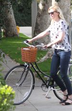 KIRSTEN DUNST Riding a Bike Out in Los Angeles