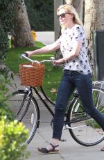 KIRSTEN DUNST Riding a Bike Out in Los Angeles