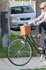 KIRSTEN DUNST Riding a Bike Out in Los Angeles