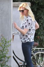 KIRSTEN DUNST Riding a Bike Out in Los Angeles
