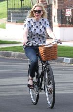 KIRSTEN DUNST Riding a Bike Out in Los Angeles