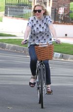 KIRSTEN DUNST Riding a Bike Out in Los Angeles