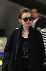 LILY COLLINS at LAX Airport in Los Angeles 1202