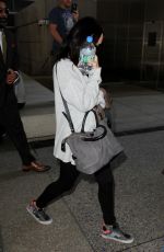 MEGAN FOX Arrives at Los Angeles International Airport 0302