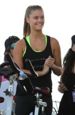 NINA AGDAL at Supersweat Redbike Spinning Event in Miami