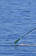 OLIVIA WILDE in Bikini Paddleboarding in Maui