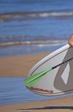 OLIVIA WILDE in Bikini Paddleboarding in Maui