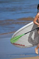 OLIVIA WILDE in Bikini Paddleboarding in Maui