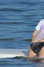 OLIVIA WILDE in Bikini Paddleboarding in Maui