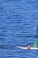 OLIVIA WILDE in Bikini Paddleboarding in Maui