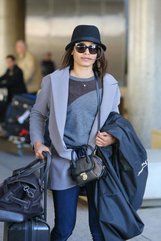 FREIDA PINTO at LAX Airport in Los Angeles