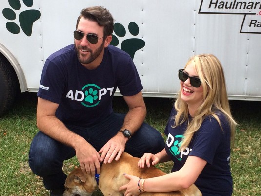 KATE UPTON Hosts the Grand Slam Adoption