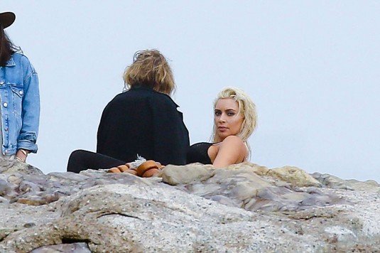 KIM KARDASHIAN on the Set of a Photoshoot in Malibu KIM KARDASHIAN at Photoshoot in Malibu