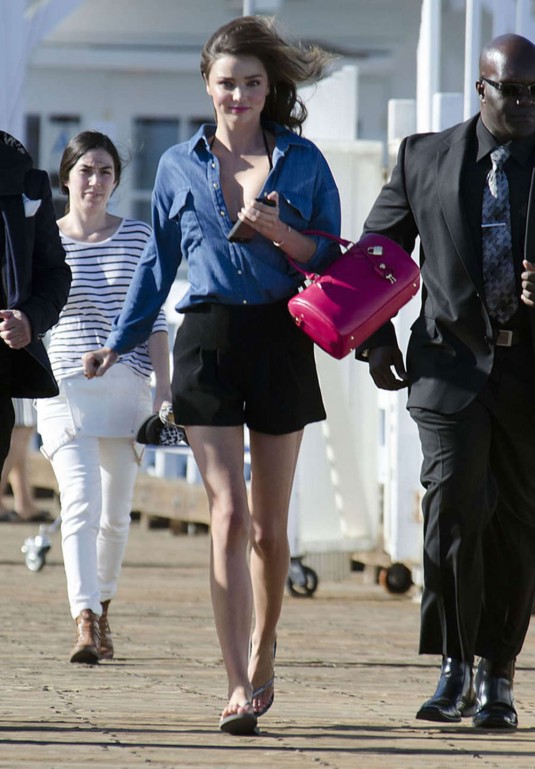 MIRANDA KERR Arrives at a Photoshoot in Malibu MIRANDA KERR in Mini Skirt