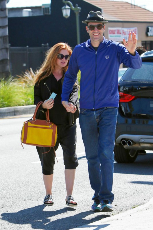 Pregnant ISLA FISHER and Sacha Baron Cohen