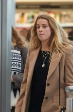 AMBER HEARD at Heathrow Airport in London