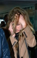 AMBER HEARD at Heathrow Airport in London