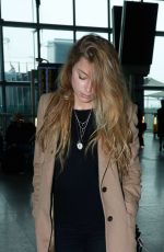 AMBER HEARD at Heathrow Airport in London