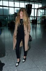 AMBER HEARD at Heathrow Airport in London