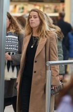 AMBER HEARD at Heathrow Airport in London