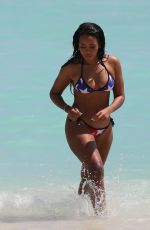 ANGELA SIMMONS in American Flag Bikini at a Beach in Miami