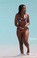 ANGELA SIMMONS in American Flag Bikini at a Beach in Miami