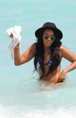 ANGELA SIMMONS in American Flag Bikini at a Beach in Miami