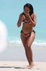 ANGELA SIMMONS in American Flag Bikini at a Beach in Miami