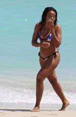 ANGELA SIMMONS in American Flag Bikini at a Beach in Miami