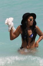 ANGELA SIMMONS in American Flag Bikini at a Beach in Miami