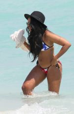 ANGELA SIMMONS in American Flag Bikini at a Beach in Miami