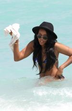 ANGELA SIMMONS in American Flag Bikini at a Beach in Miami