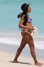 ANGELA SIMMONS in American Flag Bikini at a Beach in Miami