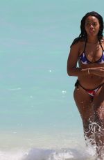 ANGELA SIMMONS in American Flag Bikini at a Beach in Miami