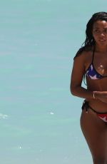 ANGELA SIMMONS in American Flag Bikini at a Beach in Miami