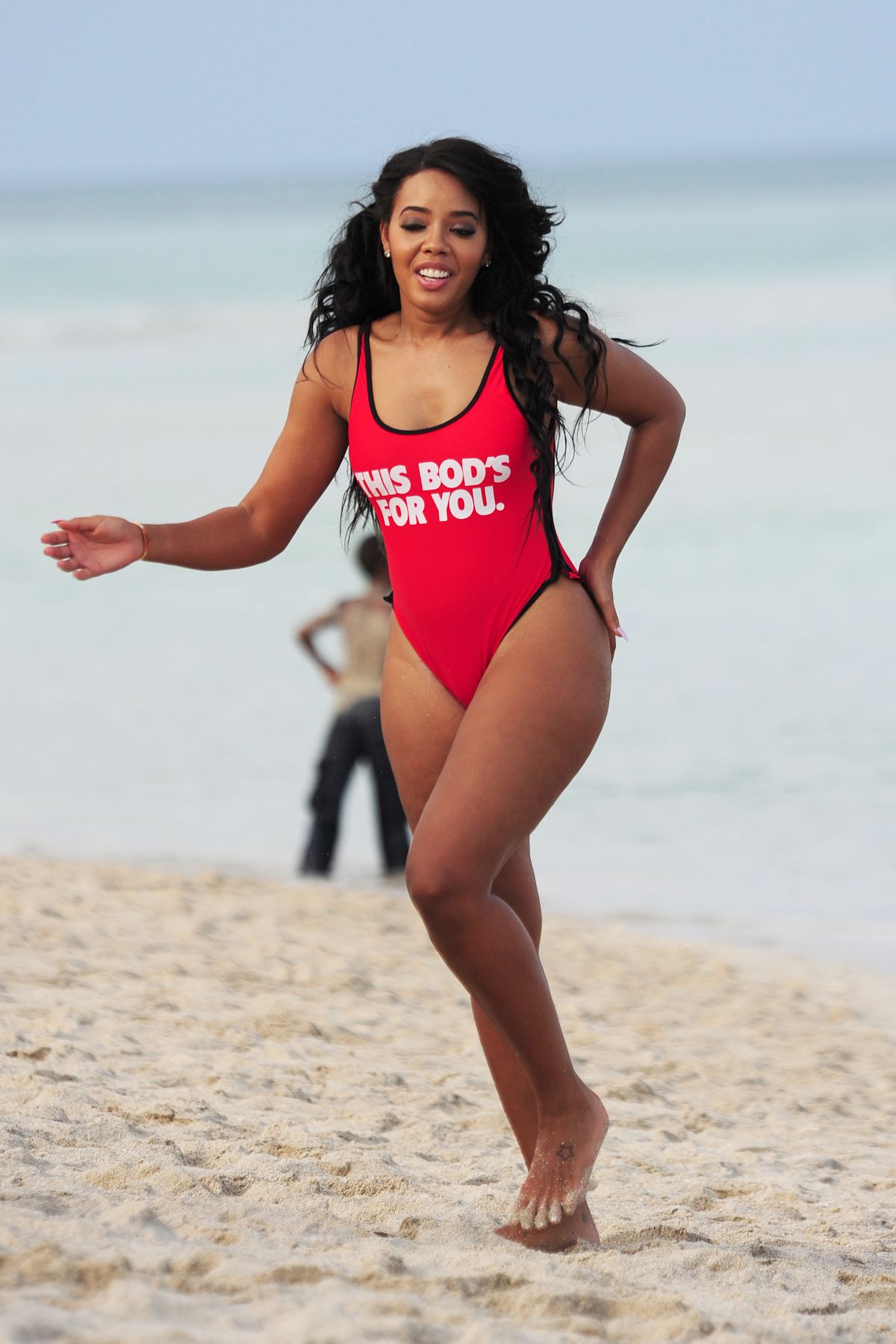 ANGELA SIMMONS in Swimsuit at a Beach in Miami.