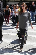 ASHLEY GREENE Arrives at LAX Airport in Los Angeles